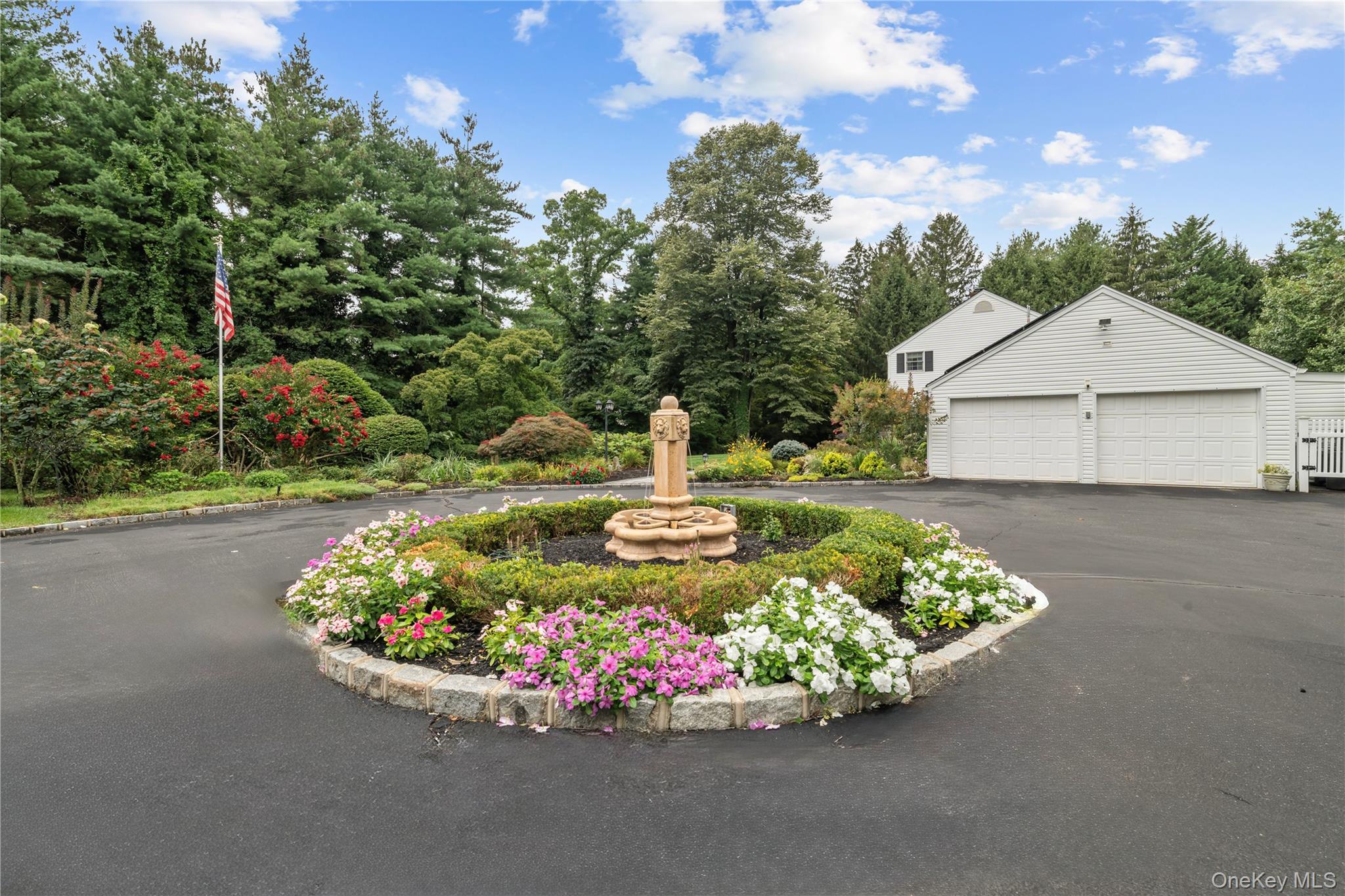 51 Bay Road Huntington Bay, NY 11743 - Photo 5 of 42 a view of a house with a yard and garden