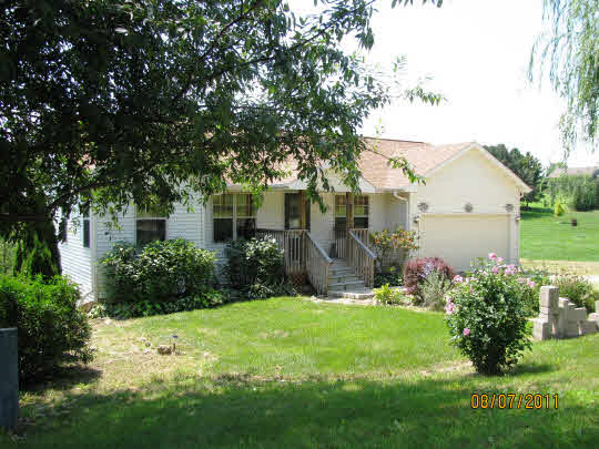 2294 Drexel Road Davis, IL 61019 - Photo 1 of 11 front view of a house with a yard
