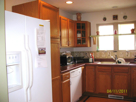 2294 Drexel Road Davis, IL 61019 - Photo 6 of 11 a kitchen with stainless steel appliances granite countertop a refrigerator and a sink