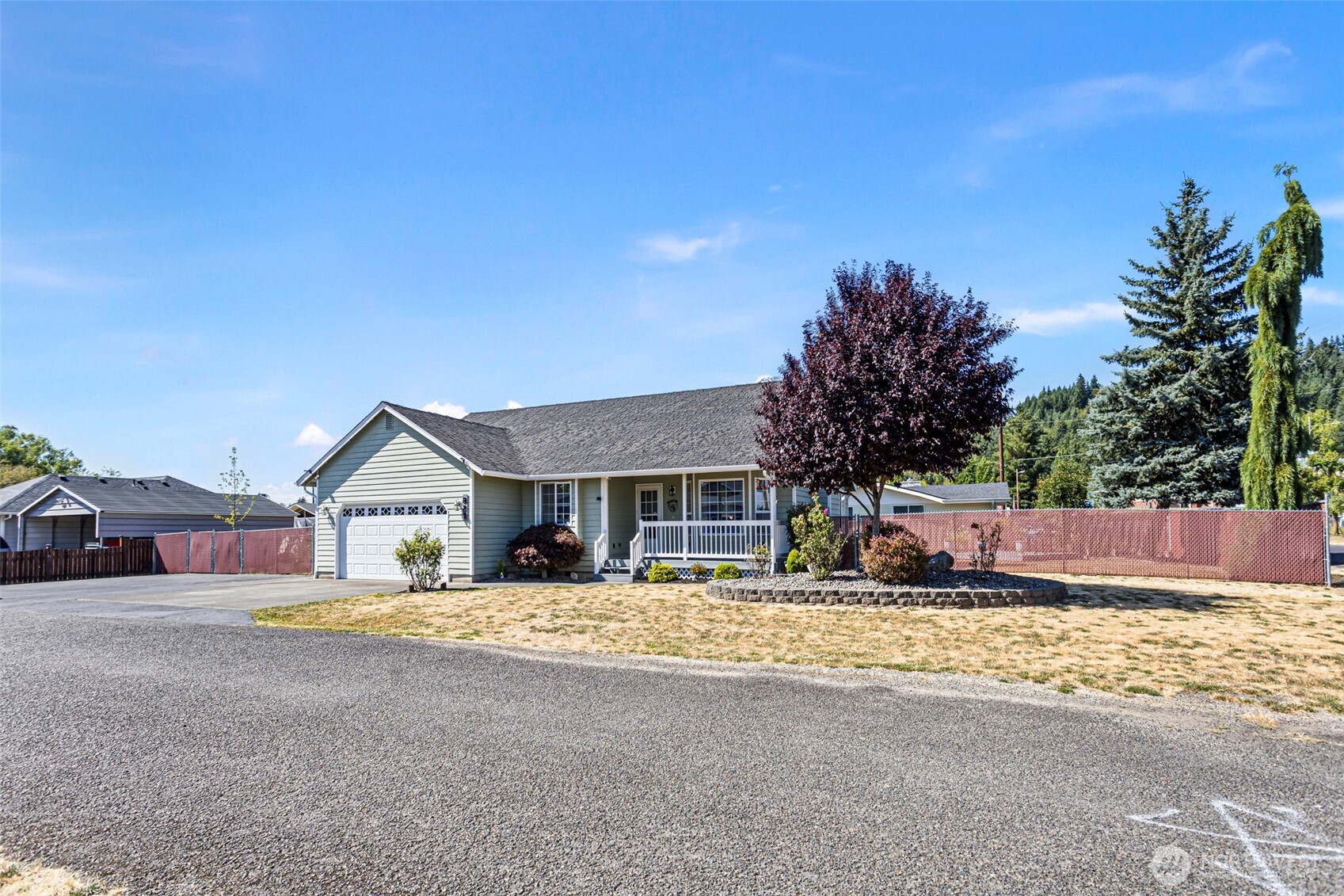 a house with palm tree in front of it