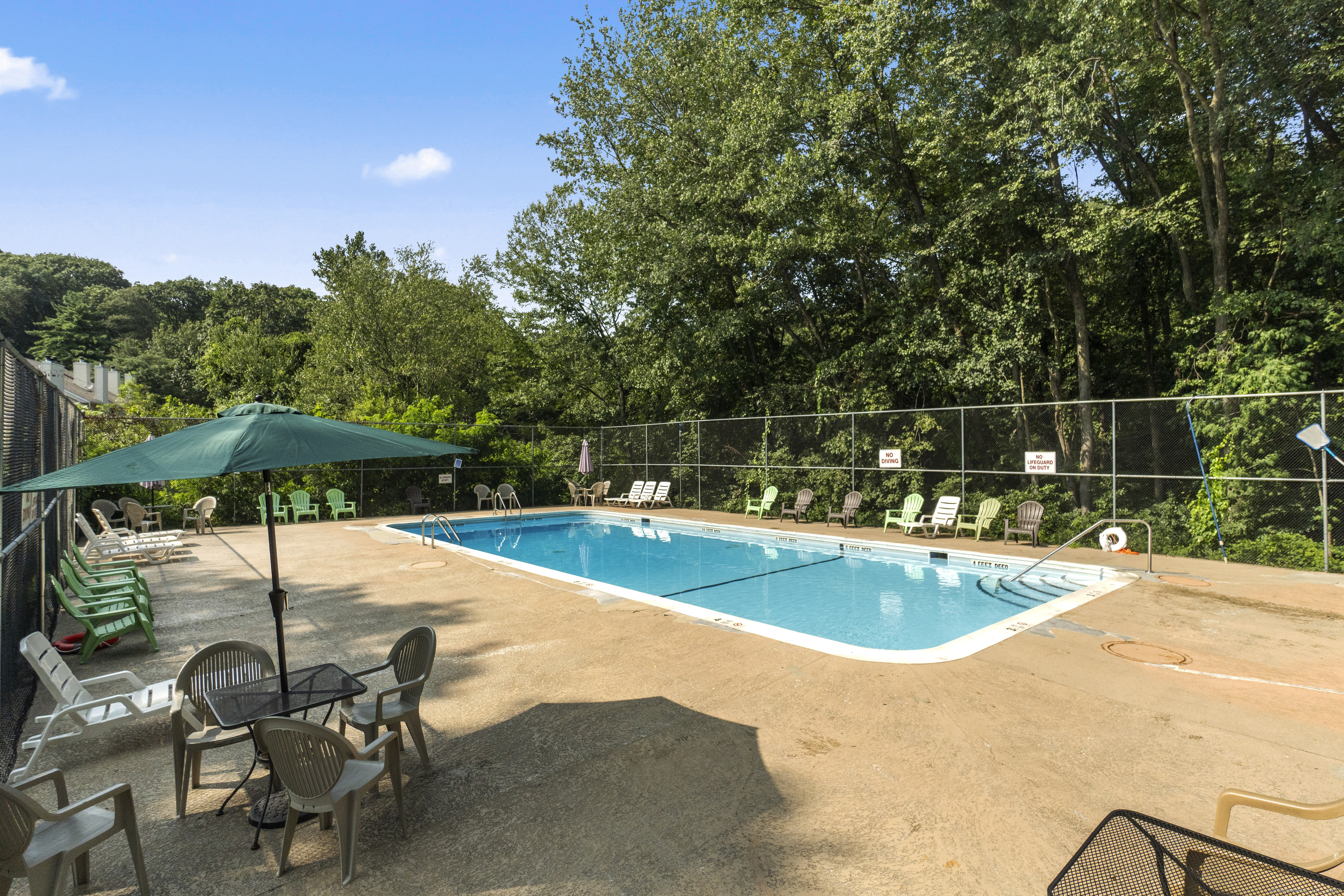8 Rose Lane, Unit 105 Danbury, CT 06811 - Photo 19 of 20 swimming pool view with a seating space