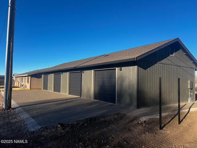 a balcony view with a backyard space