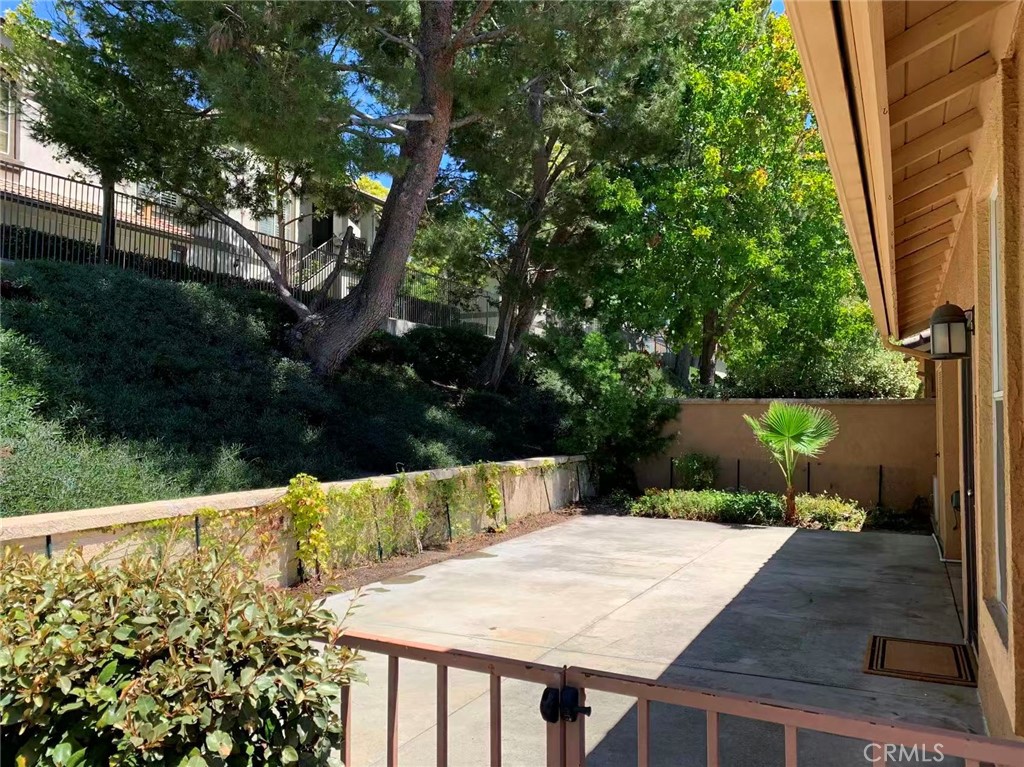 19431 Rue De Valore, Unit 50A Lake Forest, CA 92610 - Photo 21 of 29 Front yard entrance