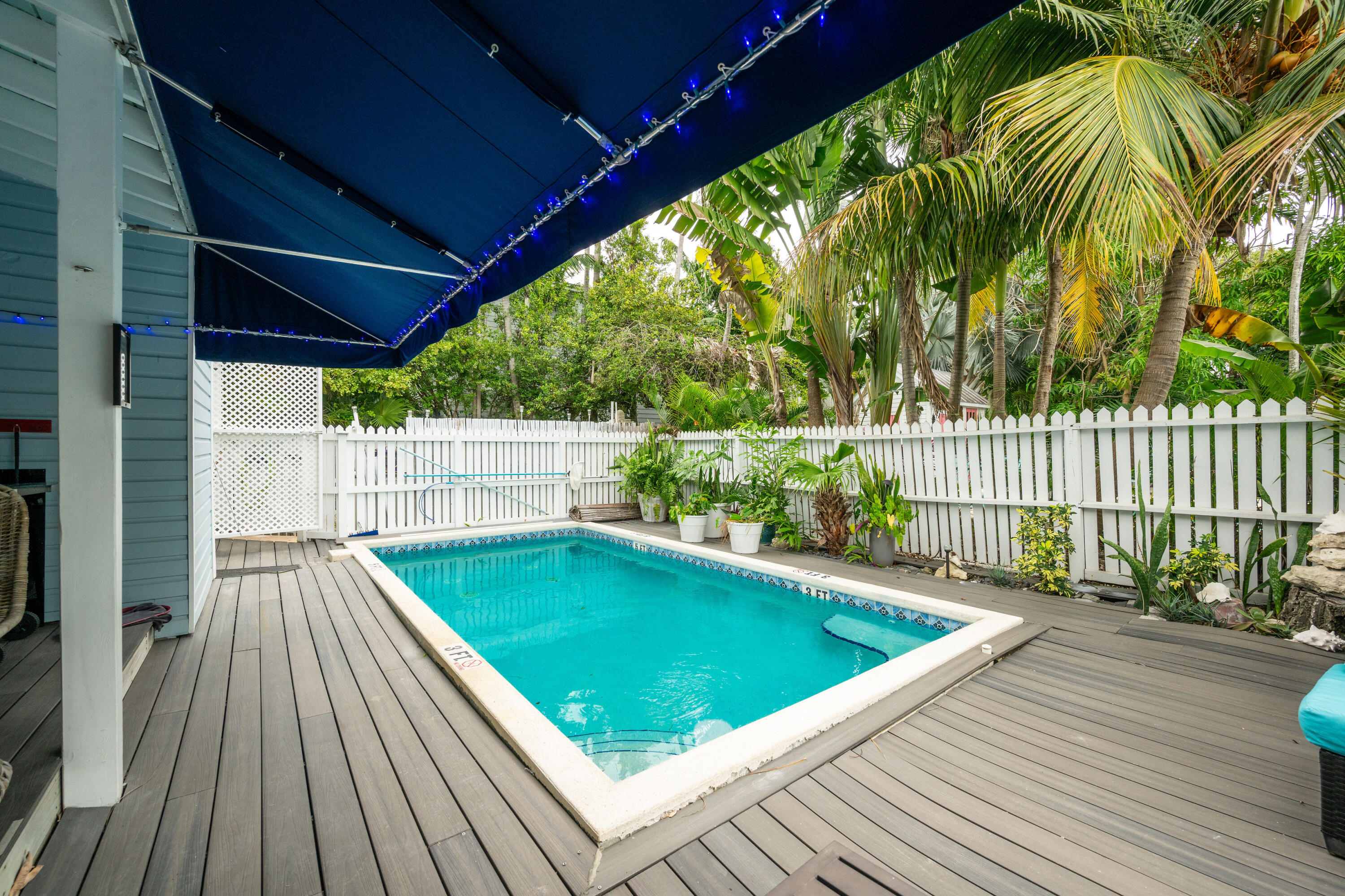 906 Truman Avenue, Unit 2 Key West, FL 33040 - Photo 15 of 33 a view of a backyard with swimming pool