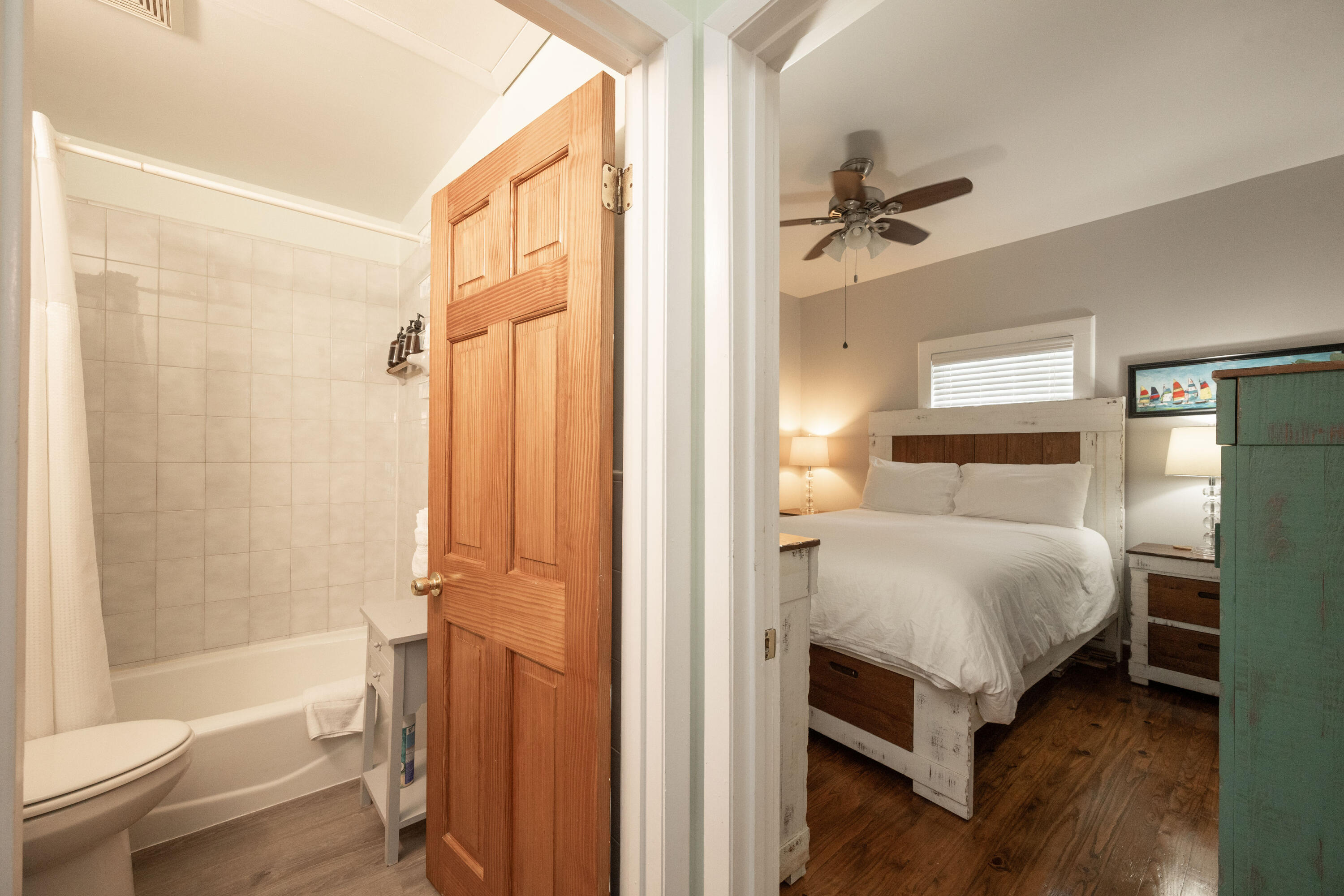 906 Truman Avenue, Unit 2 Key West, FL 33040 - Photo 22 of 33 a bedroom with a bed and a shower