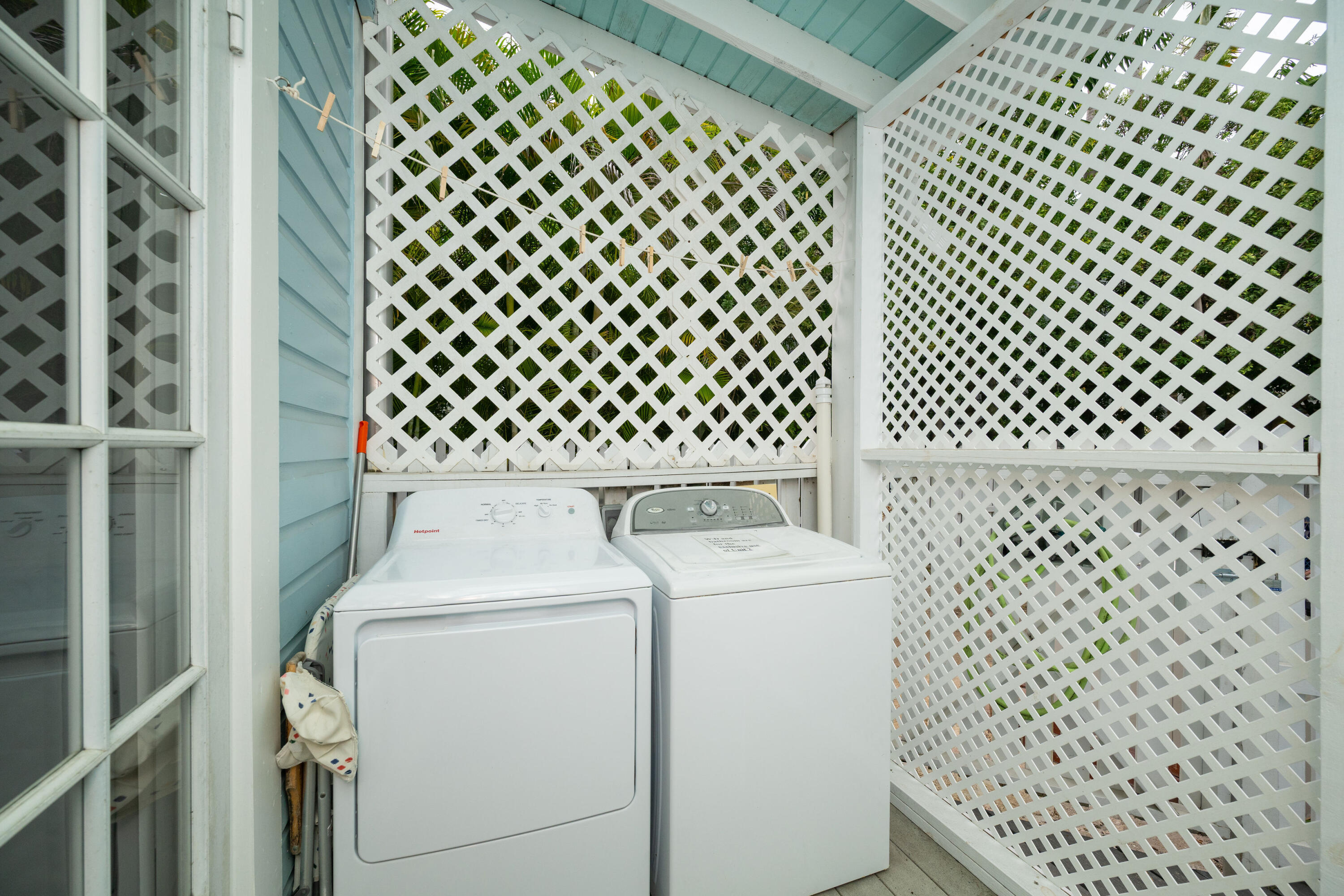 906 Truman Avenue, Unit 2 Key West, FL 33040 - Photo 31 of 33 a utility room with dryer and white door