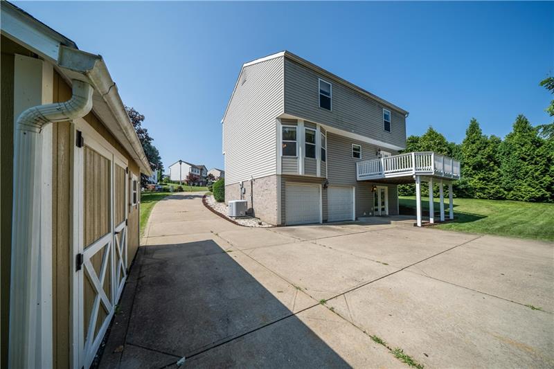 7 Wellington Court McKees Rocks, PA 15136 - Photo 20 of 25 Two-car integral garage and rear shed included.