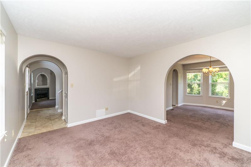 7 Wellington Court McKees Rocks, PA 15136 - Photo 10 of 25 Living room opens to dining room & foyer.