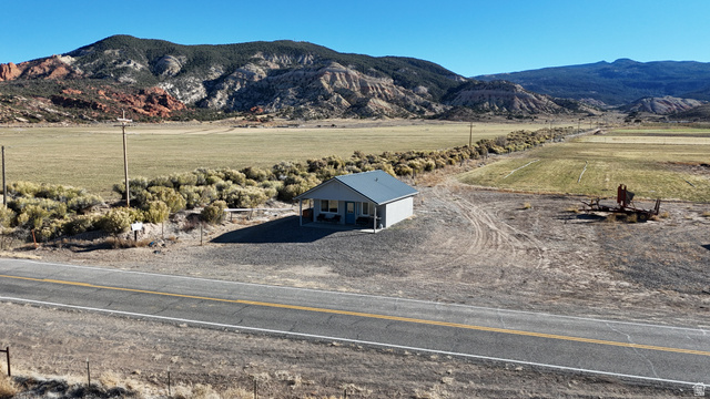 890 East Hatchery Road Bicknell, UT 84715 - Photo 24 of 48 View of mountain background featuring rural landscape