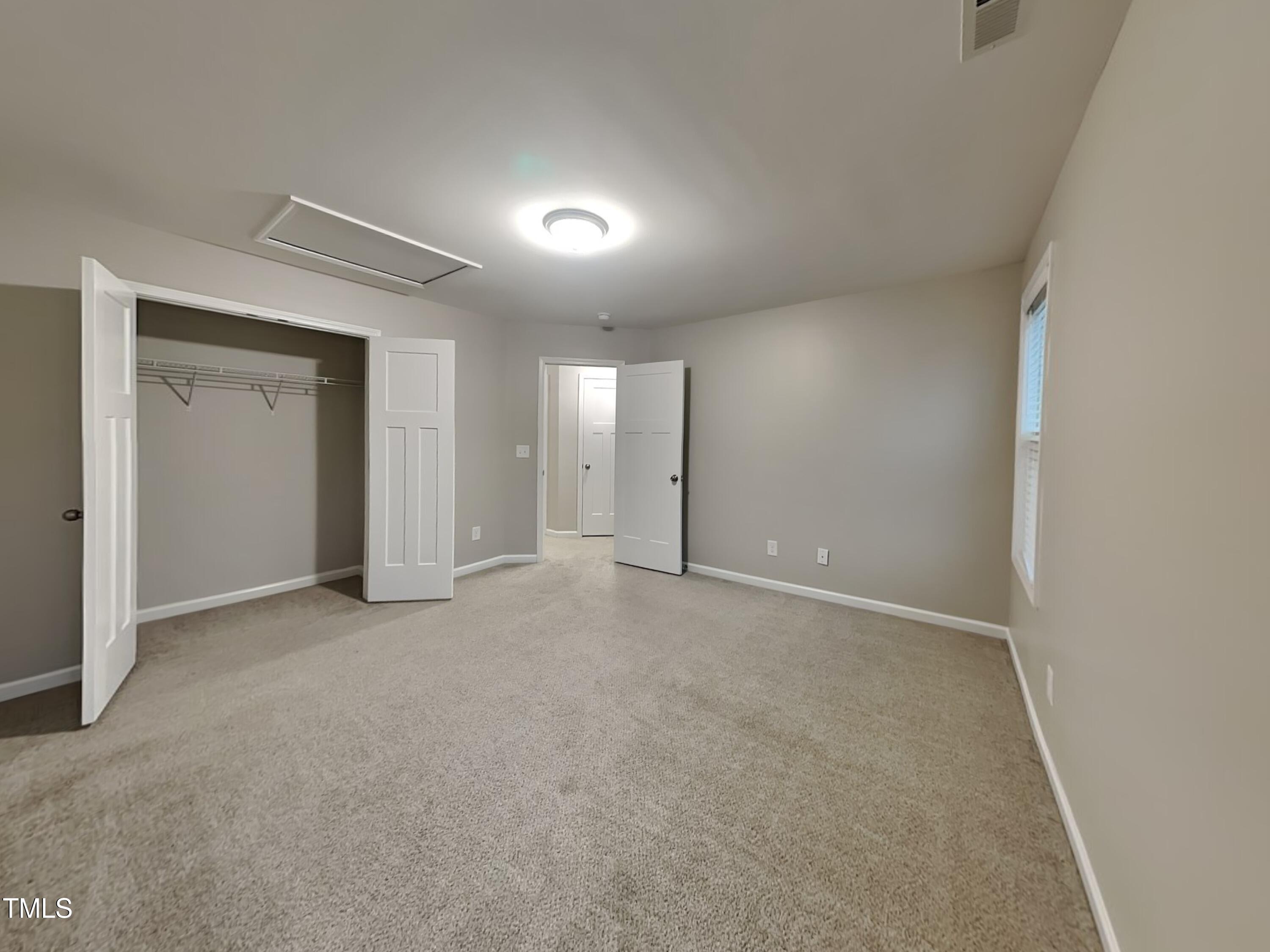 877 Juno Drive Broadway, NC 27505 - Photo 17 of 22 a view of an empty room