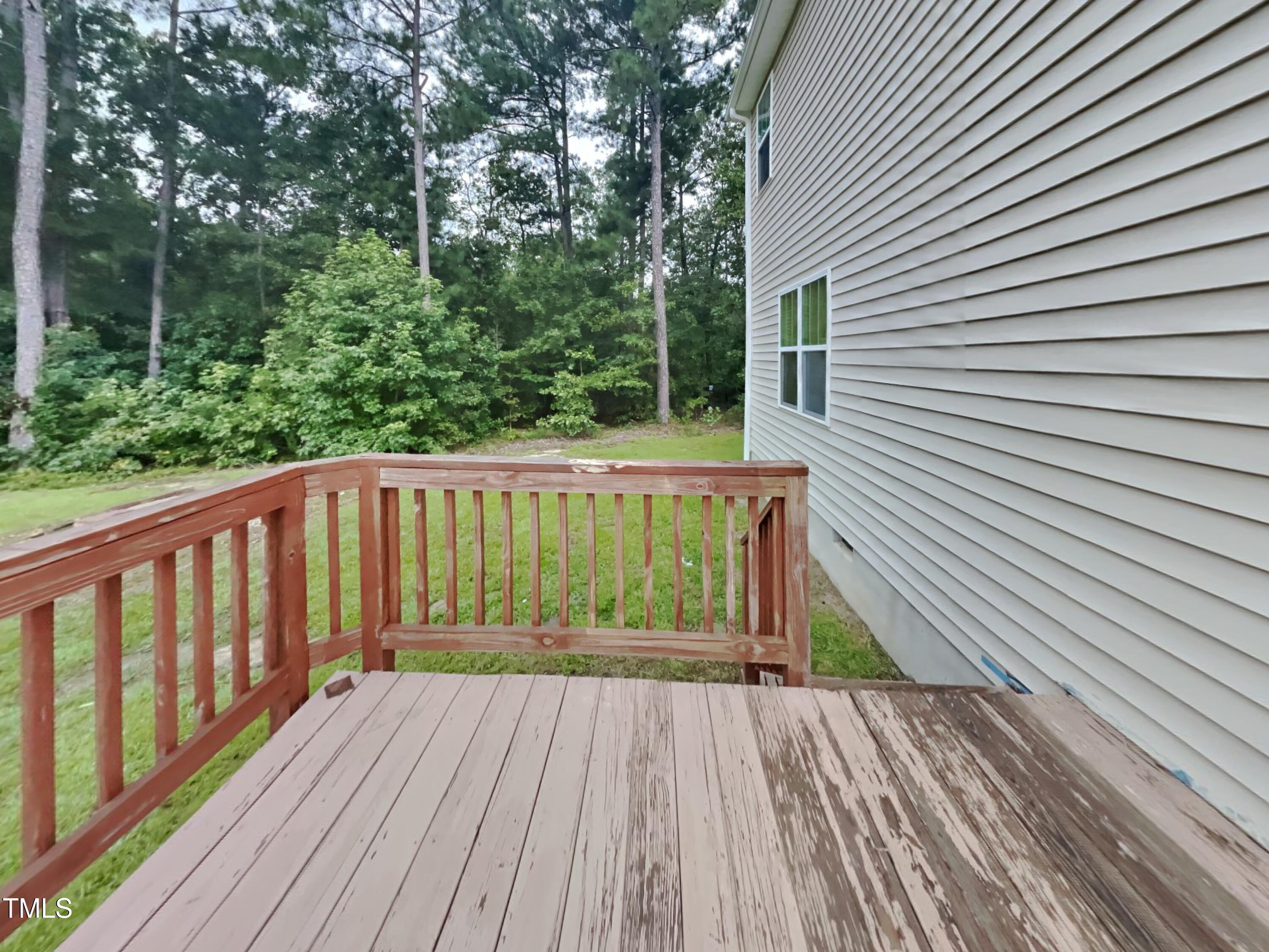 877 Juno Drive Broadway, NC 27505 - Photo 21 of 22 a view of balcony with wooden floor