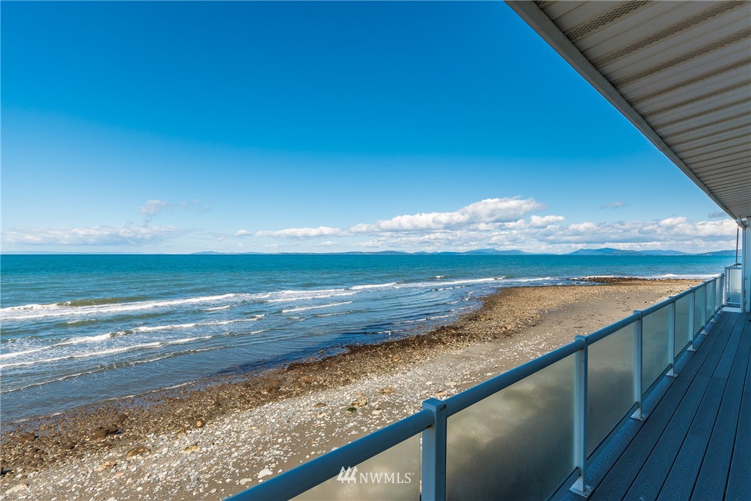 2575 West Beach Road Oak Harbor, WA 98277 - Photo 22 of 25 a view of an ocean from a balcony
