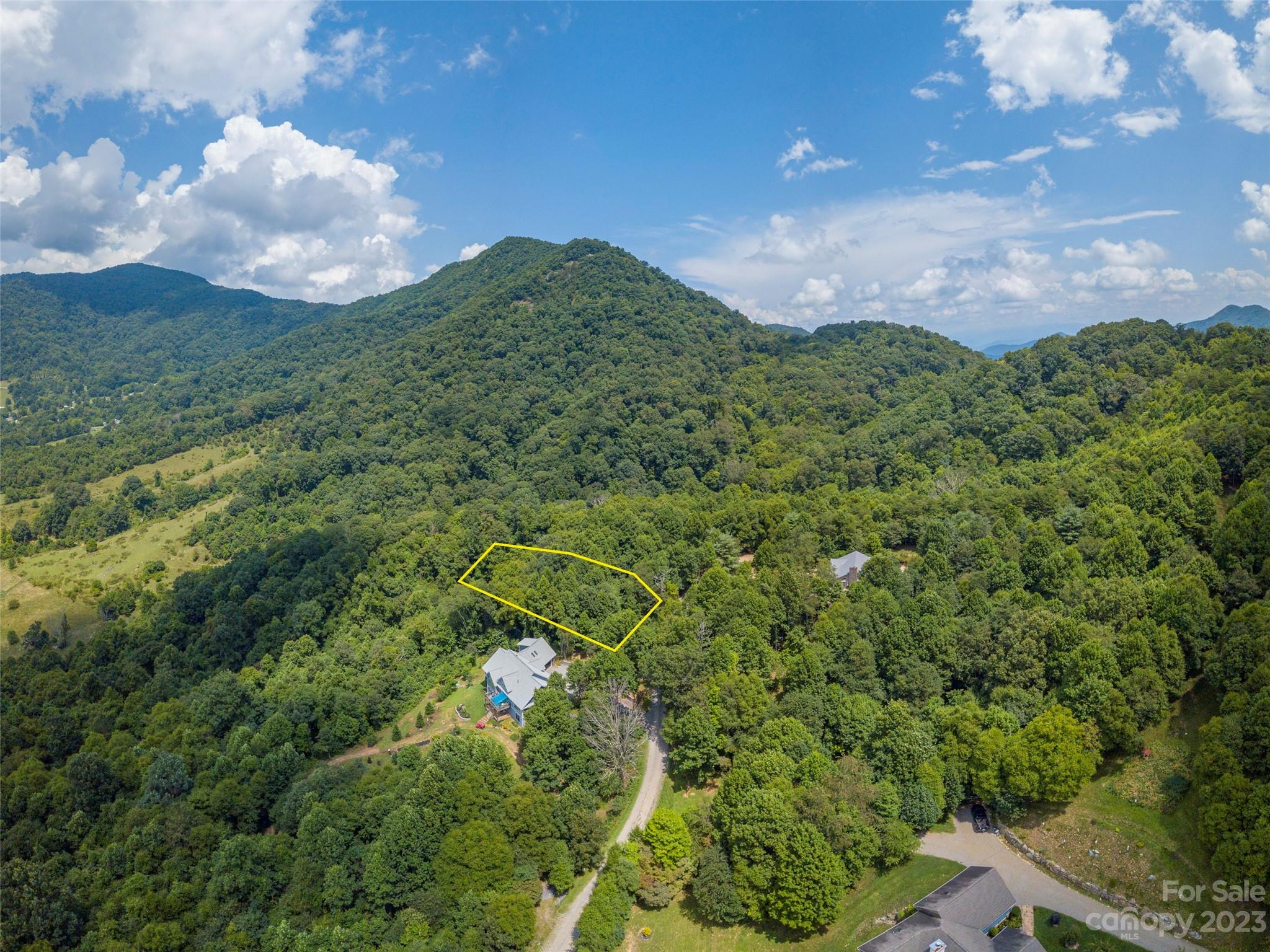 1373 Hunters Ridge Road, Unit 51 Canton, NC 28716 - Photo 5 of 7 a view of a big yard