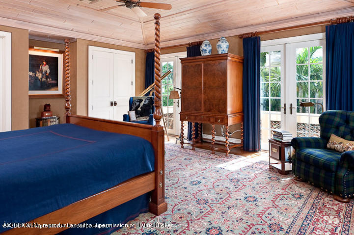 230 Wells Road Palm Beach, FL 33480 - Photo 8 of 9 a bedroom with bed and glass door