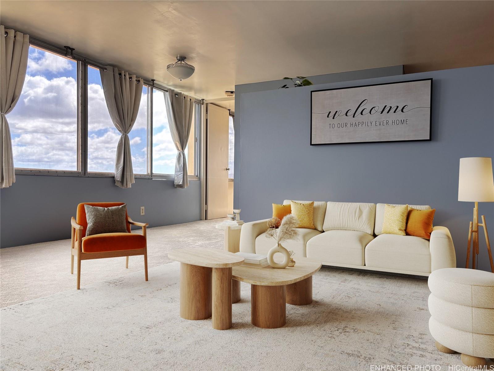 a living room with furniture and a large window