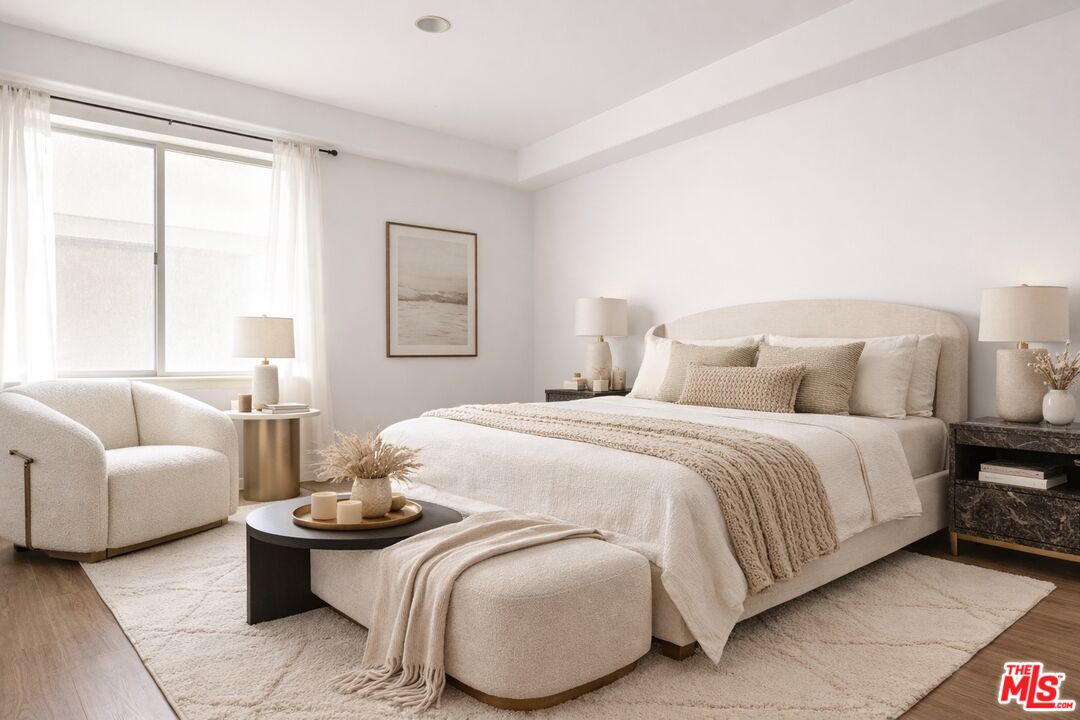 8238 West Manchester Avenue, Unit 108 Playa del Rey, CA 90293 - Photo 11 of 16 a bedroom with bed and a couch