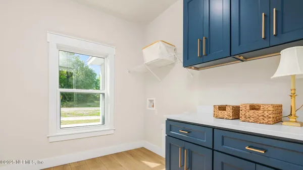 a bathroom with a shower and a window
