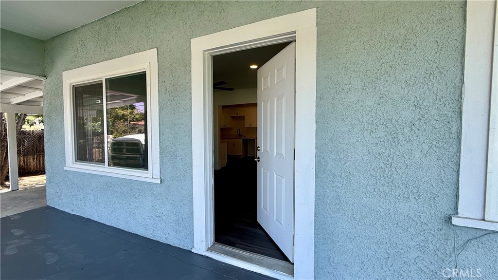 4542 Bandini Avenue Riverside, CA 92506 - Photo 3 of 22 front view of a house with a glass door