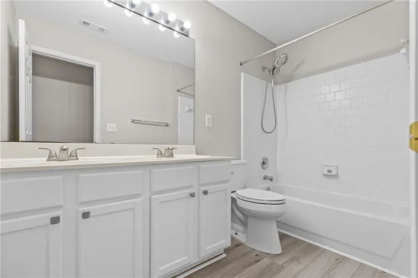 a backyard of a house with lots of green space