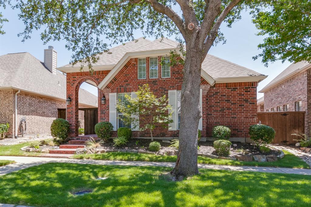 7728 Lancaster Gate Frisco, TX 75035 - Photo 2 of 30 a front view of a house with a yard