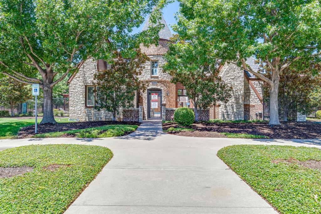 7728 Lancaster Gate Frisco, TX 75035 - Photo 29 of 30 a front view of a house with a yard and fountain