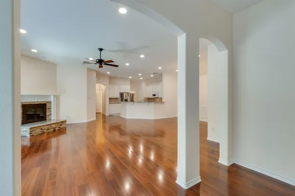 a view of a kitchen with a sink and a kitchen view