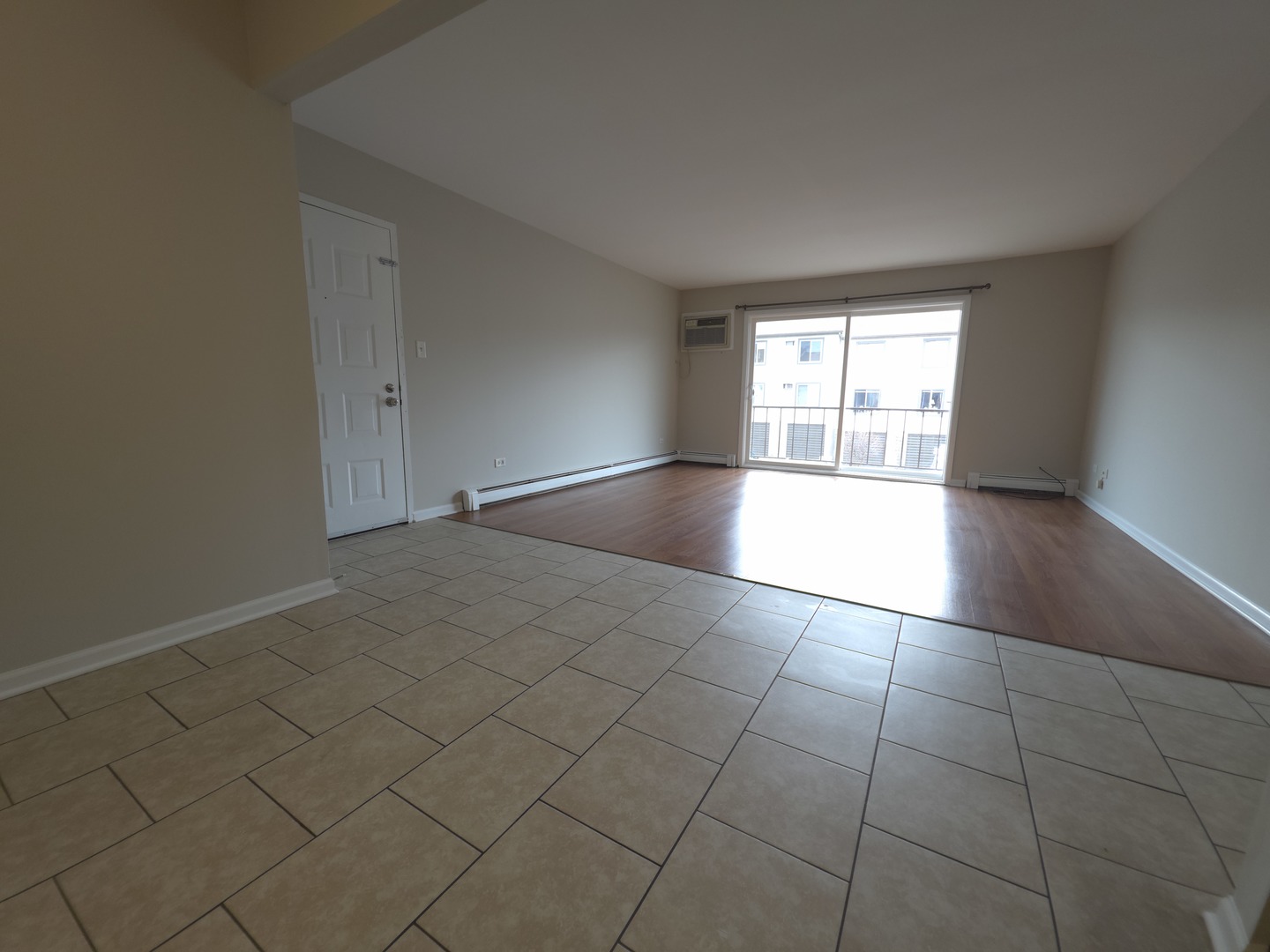 412 East Bailey Road, Unit 101 Naperville, IL 60565 - Photo 3 of 12 an empty room with windows