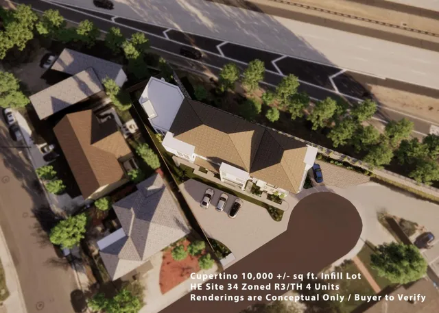 an aerial view of a backyard with garden