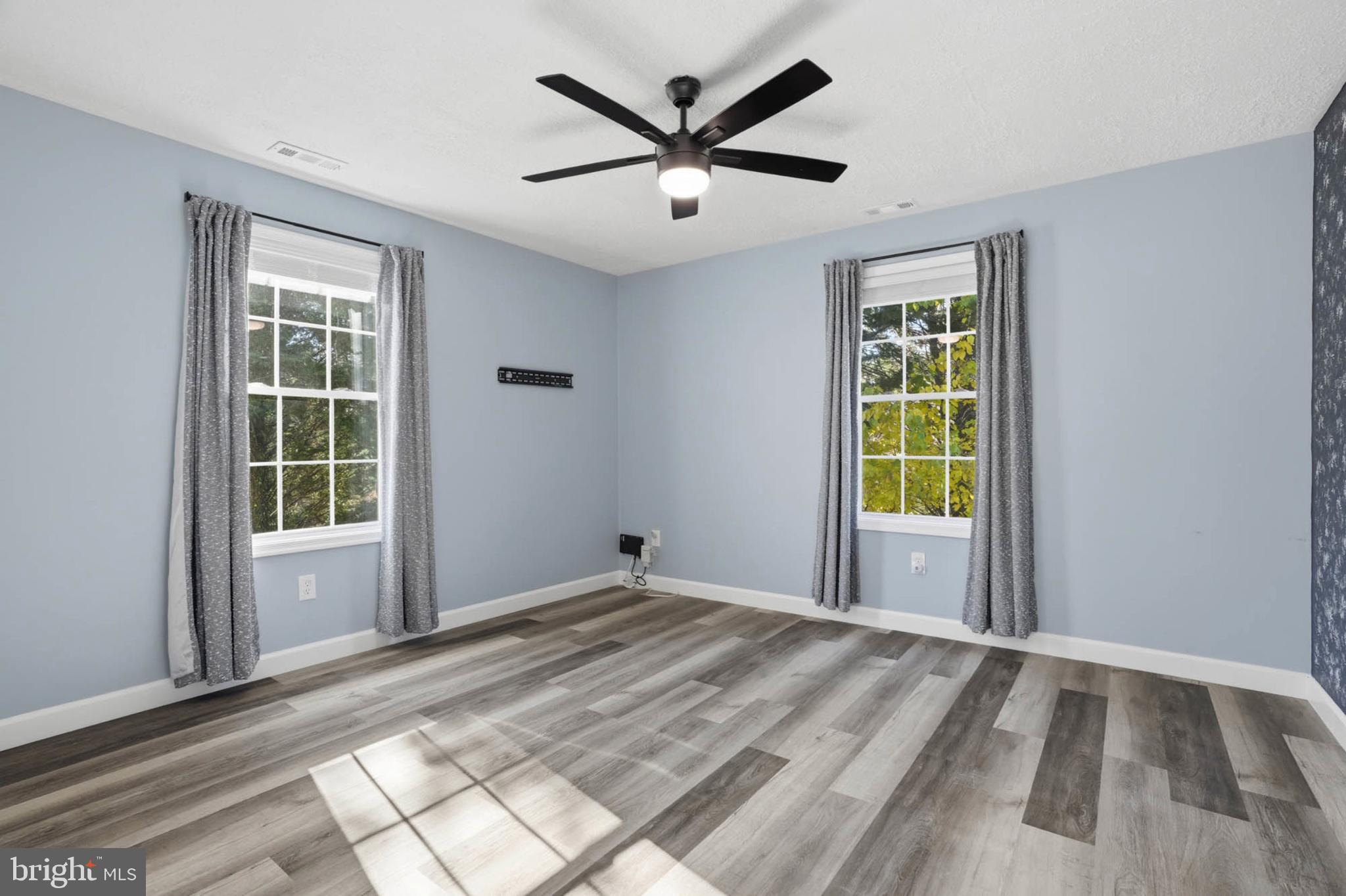 2405 Jerusalem Road Joppa, MD 21085 - Photo 15 of 23 Bright and airy room with serene blue walls.
