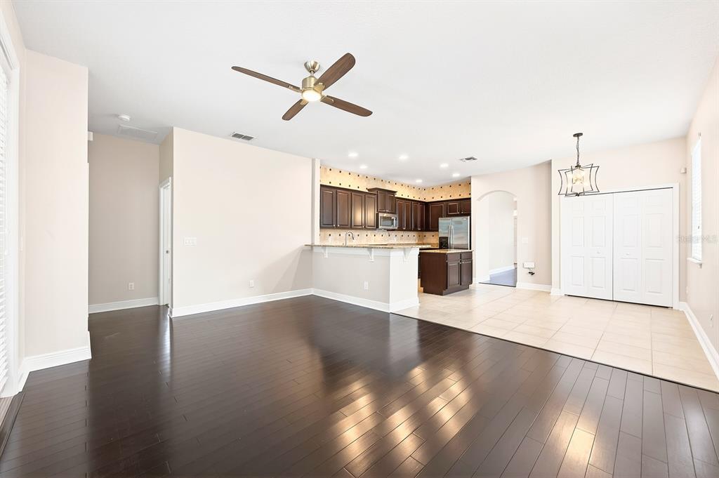 918 Seburn Road Apopka, FL 32703 - Photo 13 of 34 a view of a kitchen with wooden floor and a kitchen