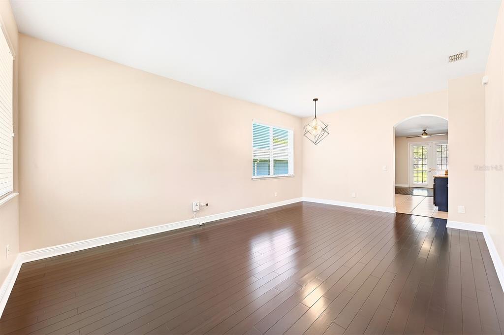 918 Seburn Road Apopka, FL 32703 - Photo 30 of 34 a view of empty room with wooden floor and fan