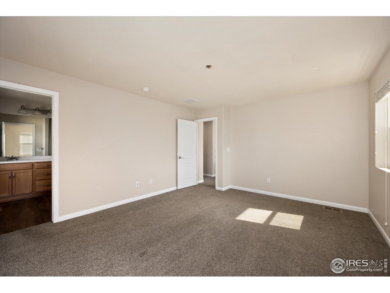 4874 Sandy Ridge Avenue Firestone, CO 80504 - Photo 13 of 35 a view of an empty room