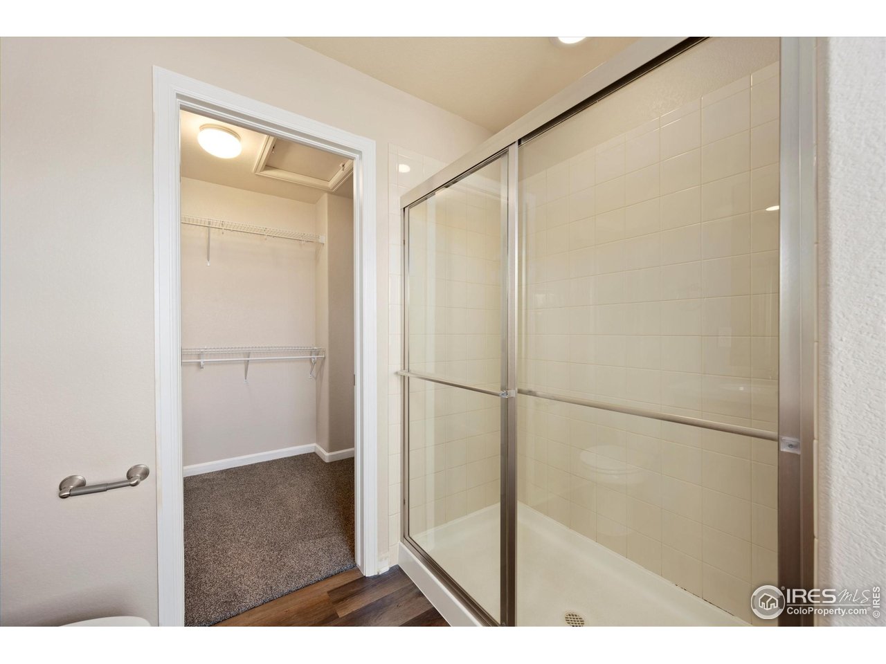4874 Sandy Ridge Avenue Firestone, CO 80504 - Photo 16 of 35 a bathroom with a shower
