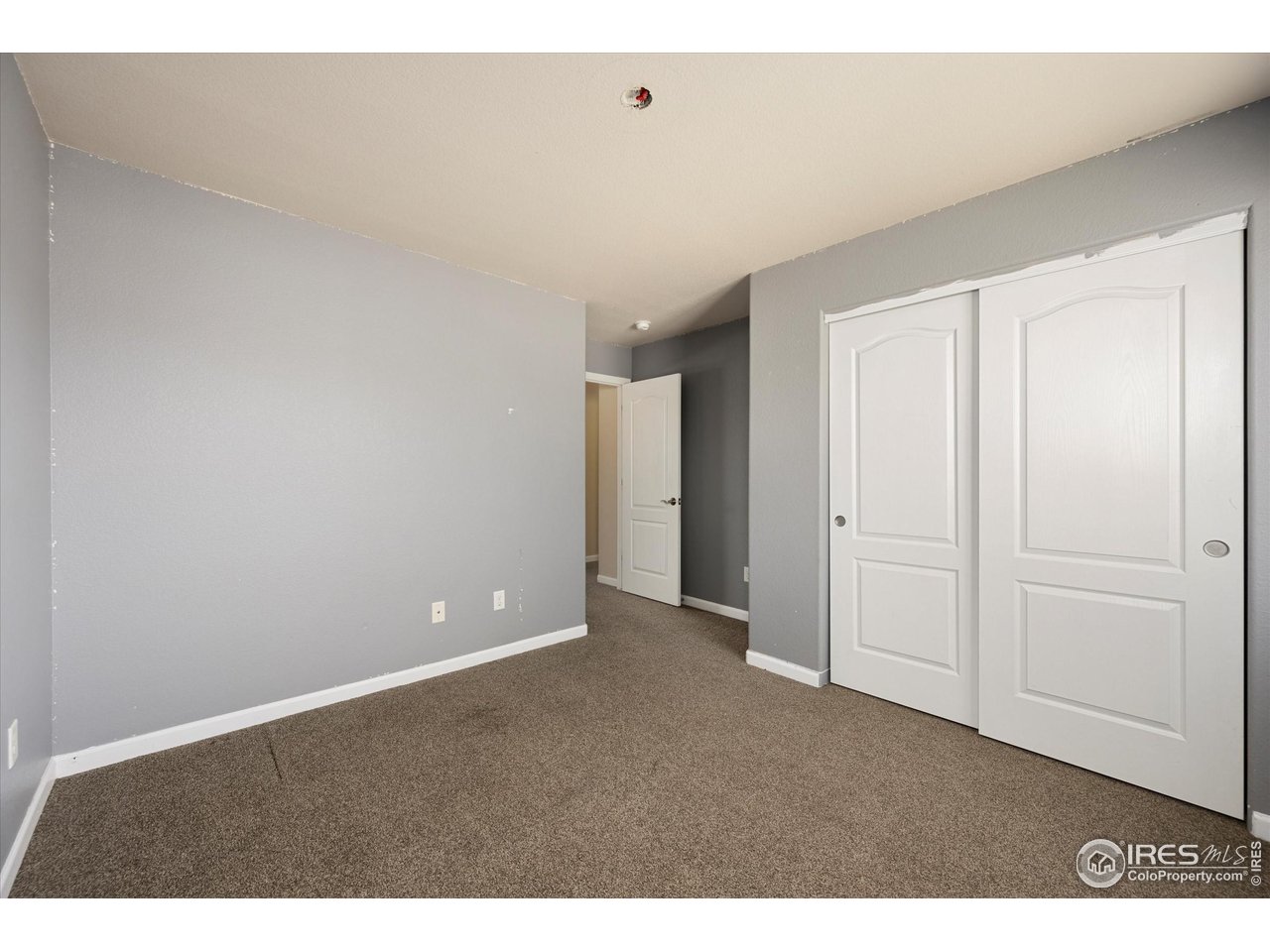 4874 Sandy Ridge Avenue Firestone, CO 80504 - Photo 22 of 35 a view of an empty room