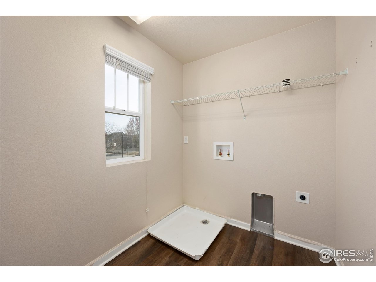 4874 Sandy Ridge Avenue Firestone, CO 80504 - Photo 25 of 35 a picture of room with a window