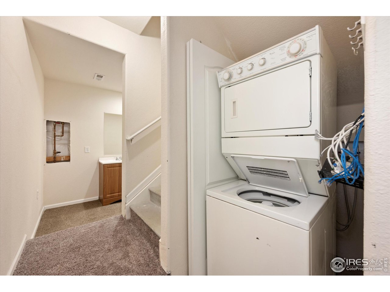 4874 Sandy Ridge Avenue Firestone, CO 80504 - Photo 26 of 35 a utility room with dryer and washer