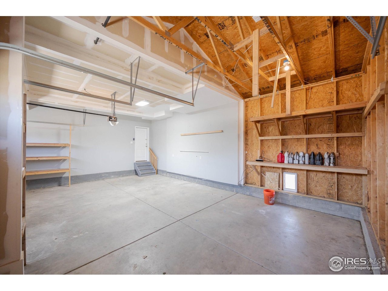 4874 Sandy Ridge Avenue Firestone, CO 80504 - Photo 30 of 35 a view of a room with racks on the wall