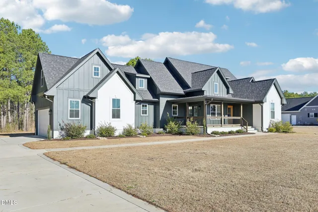 a front view of a house with a porch