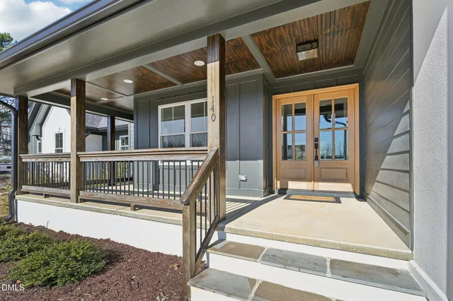 a view of a house with a porch