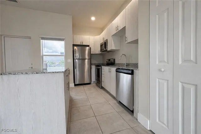 $1,345 | 3303 Southwest 8th Place, Unit 201, Cape Coral, FL 33914