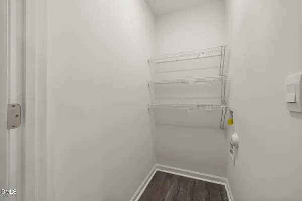 a kitchen with a refrigerator stove and microwave