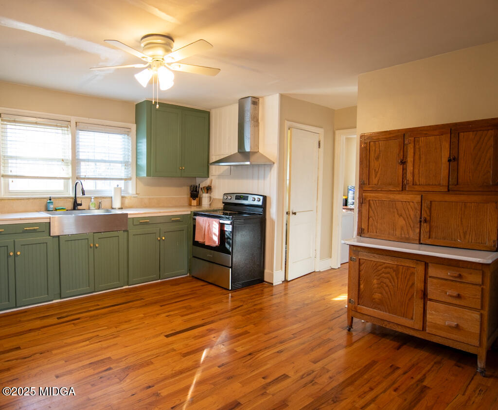 3160 Walden Road Macon, GA 31216 - Photo 1 of 32 a kitchen with stainless steel appliances granite countertop a sink cabinets and wooden floor