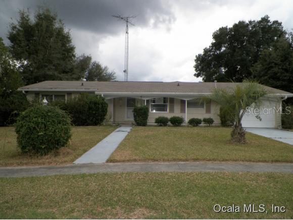 3500 Southwest 147 Lane Road Ocala, FL 34473 - Photo 1 of 1 a view of a house with a yard
