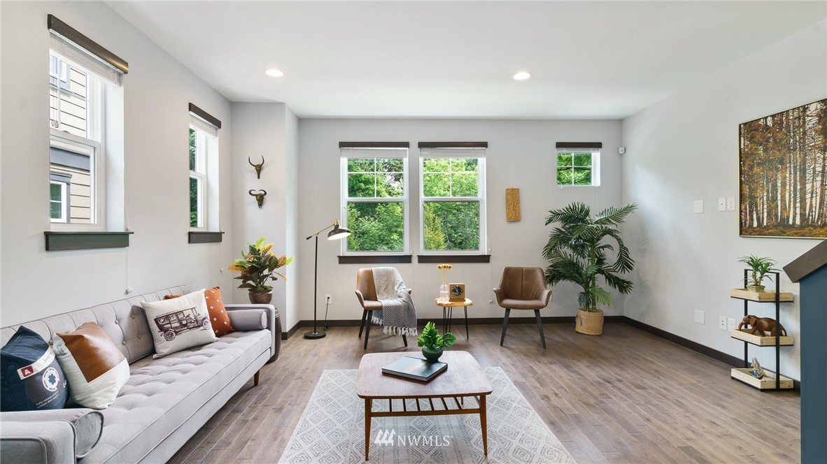 7170 Shinkle Place Southwest Seattle, WA 98106 - Photo 16 of 29 a living room with furniture and a large window