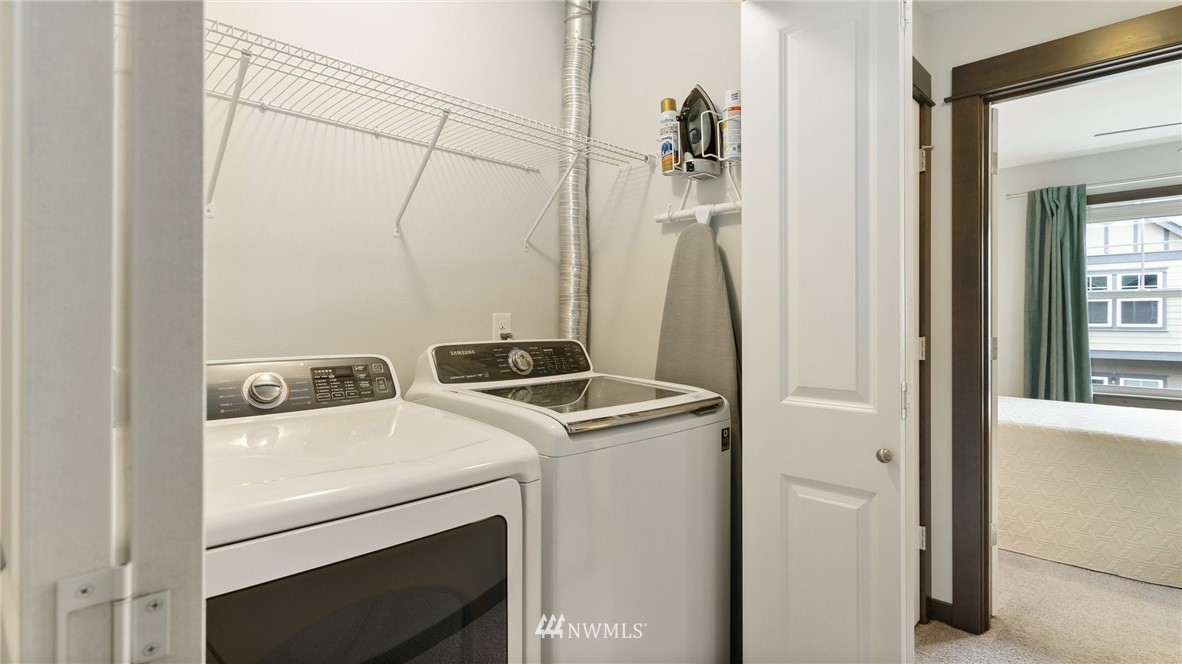 7170 Shinkle Place Southwest Seattle, WA 98106 - Photo 26 of 29 a utility room with dryer and washer