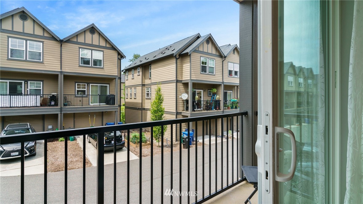 7170 Shinkle Place Southwest Seattle, WA 98106 - Photo 9 of 29 a view of a houses from a balcony