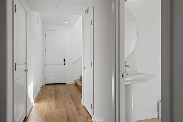 a bedroom with a bed and night stand