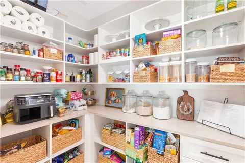 a living room with furniture fireplace and a flat screen tv