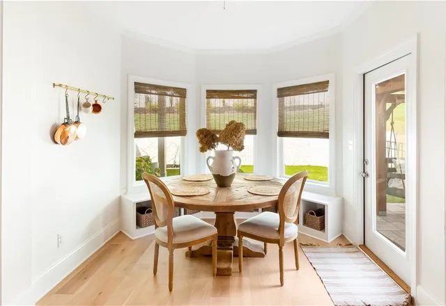 a living room with furniture and entry gate