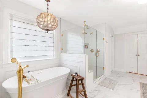 a view of a living room and entryway